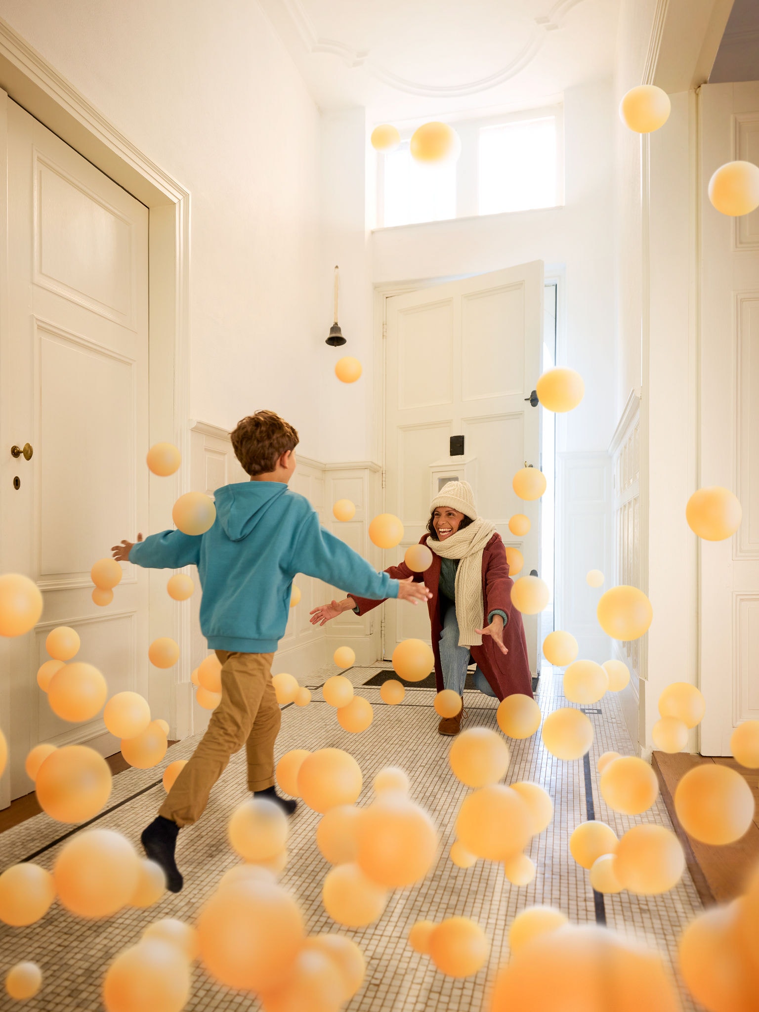 Woman and child in hallway