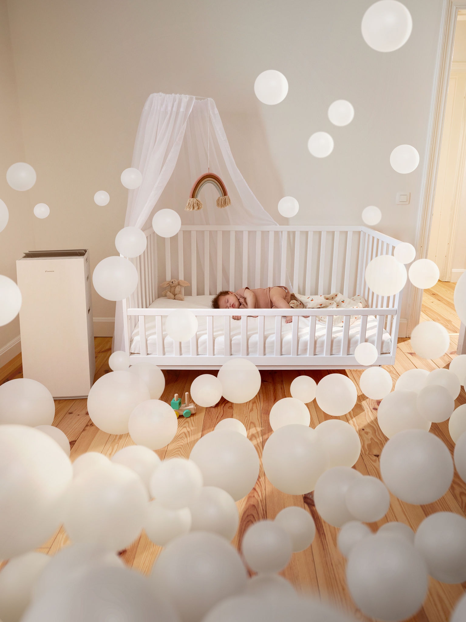 Baby sleeping peacefully in a nursery with an air purifier, enjoying clean air and healthy indoor air quality