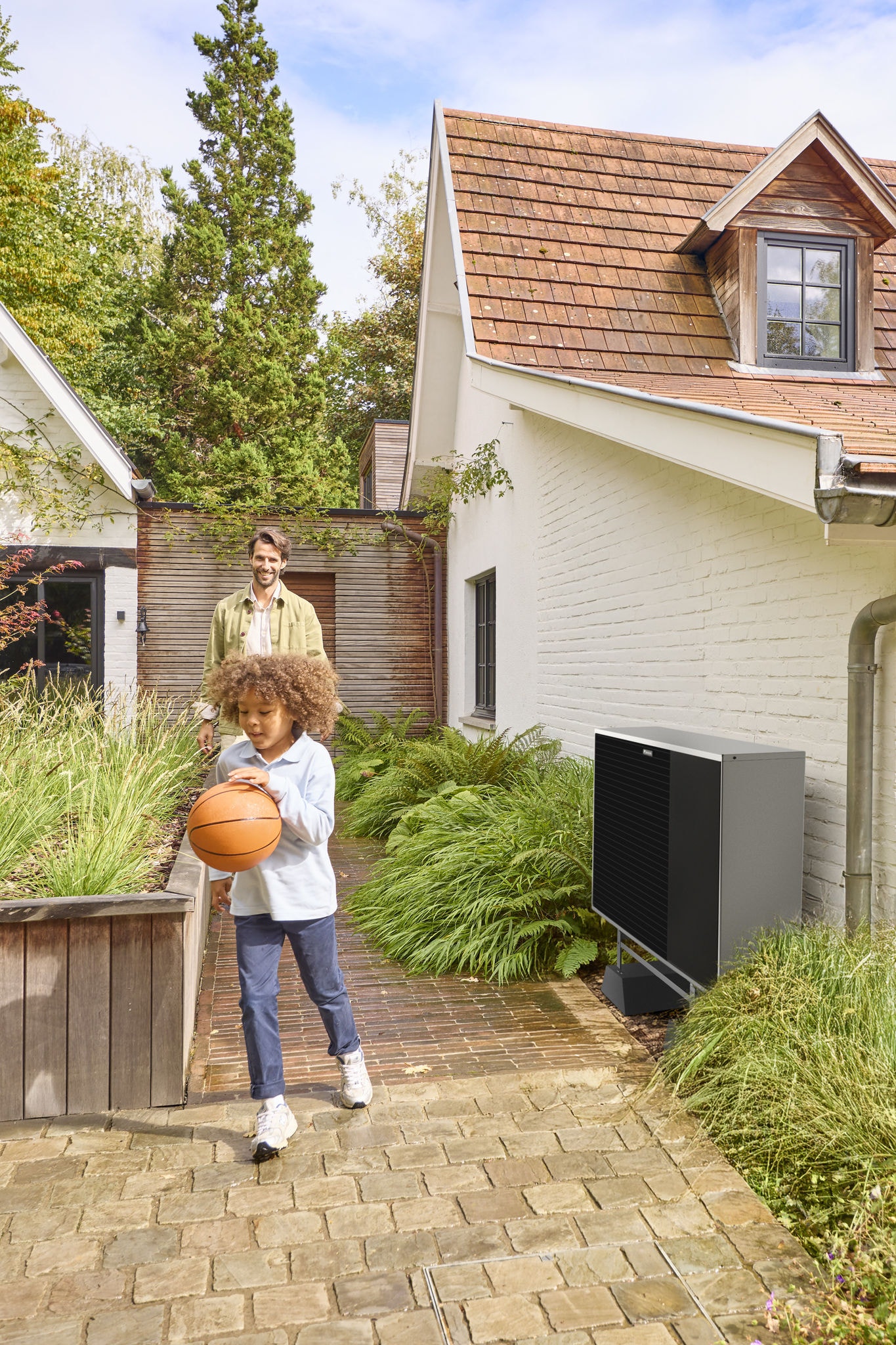 Family home with air source heat pump providing efficient heating