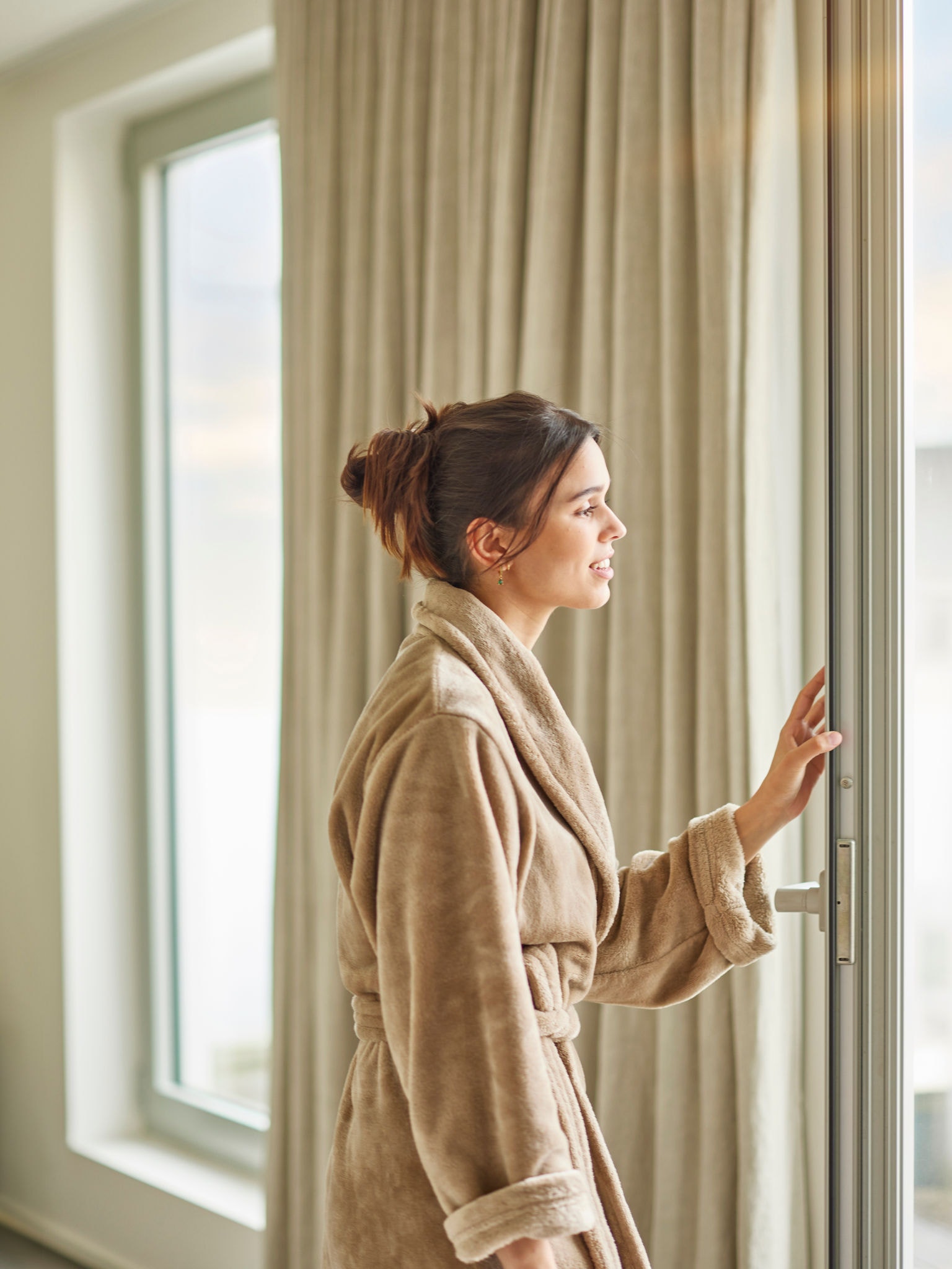 Woman enjoying perfect temperature with low noise levels