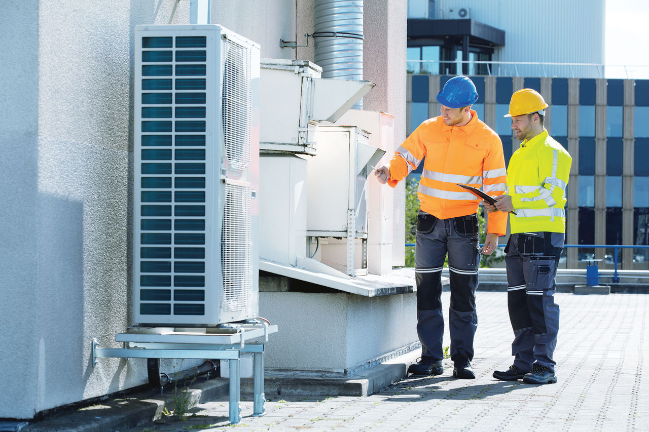 Men working on HVAC